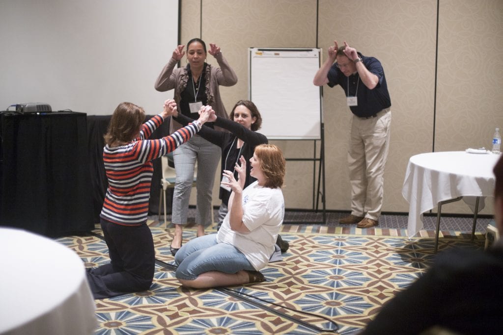 Trainers Institute participants small group activity in their session.